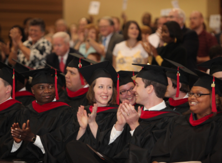 Theology students applaud at graduation