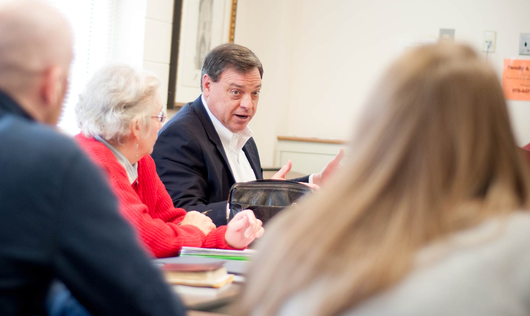 Dr. Nash talking to a group in a classroom