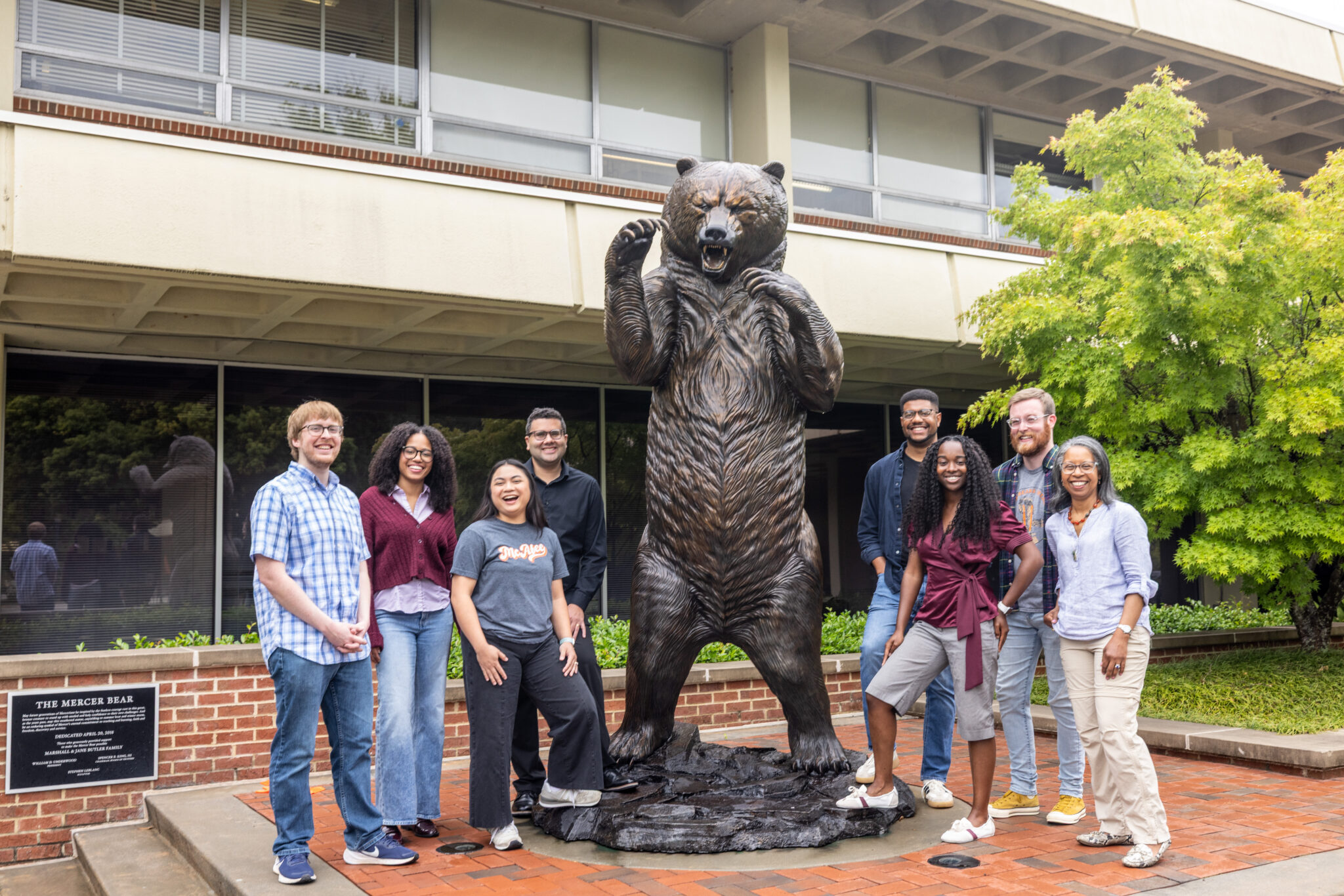 Students in front of bear statue